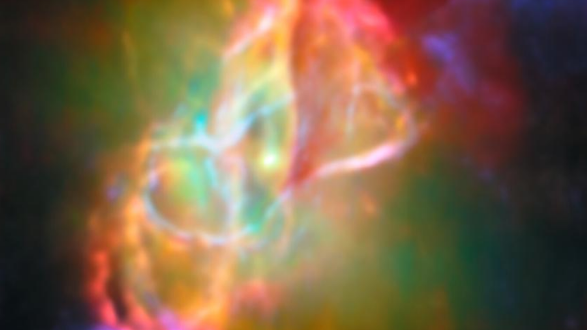 This image, combining James Webb Space Telescope infrared data with ALMA submillimetre observations, shows the Butterfly Nebula’s central star surrounded by a vertical doughnut-shaped torus, bright red helium and neon gas bubbles, and opposing jets of ionised iron.