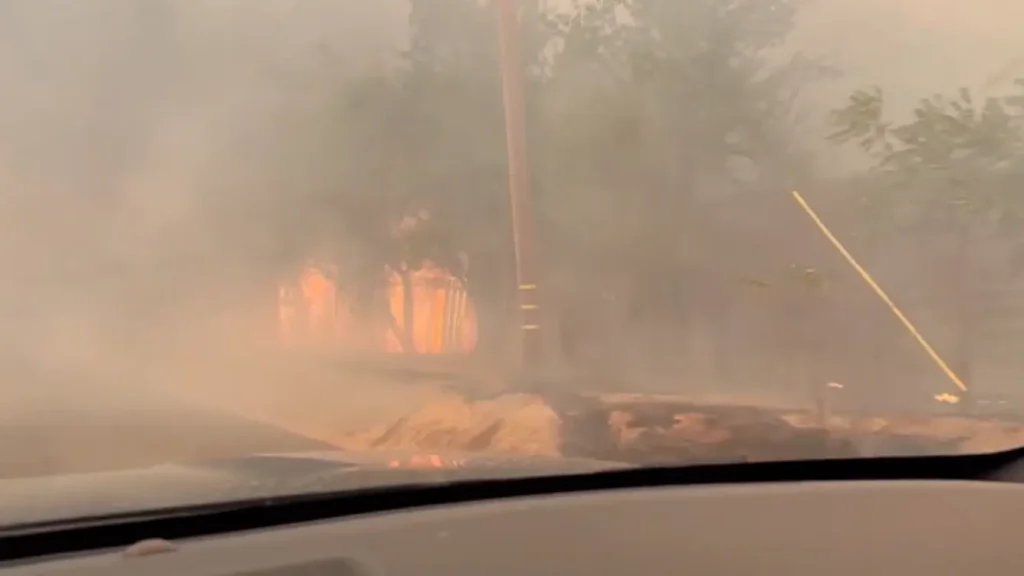 Structures are seen burning as the 6-5 Fire rages in California on September 2, 2025
