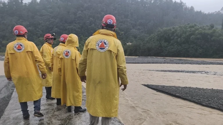 Civil protection agencies in Hispaniola inspecting areas flooded by heavy rains from Hurricane Melissa on October 25, 2025. Credit: Defensa Civil Dominicana