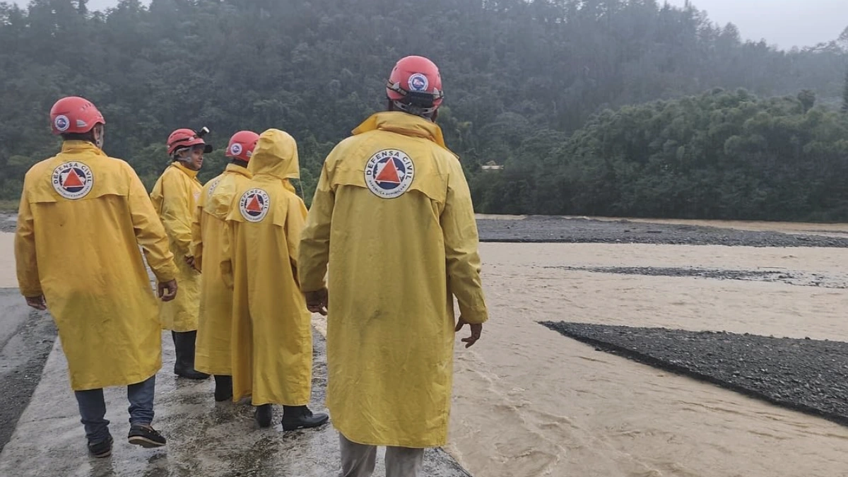 Civil protection agencies in Hispaniola inspecting areas flooded by heavy rains from Hurricane Melissa on October 25, 2025. Credit: Defensa Civil Dominicana