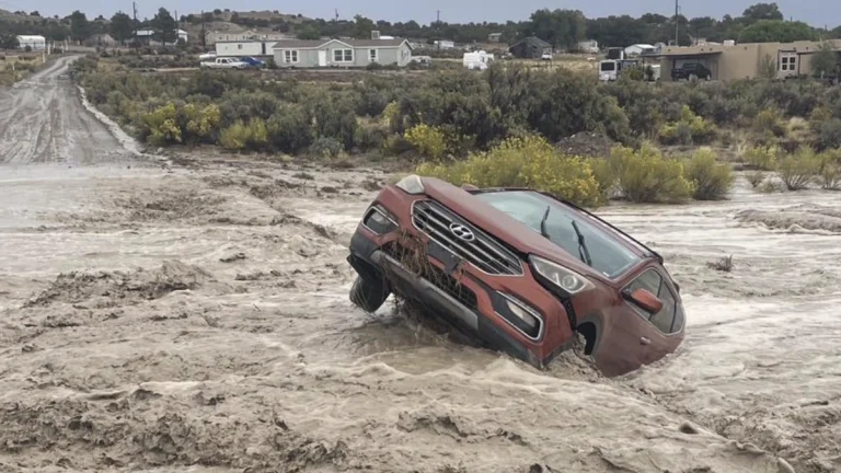 Floodwaters sweep away a vehicle in San Juan County, New Mexico on October 11, 2025. Credit: San Juan County Fire & Rescue