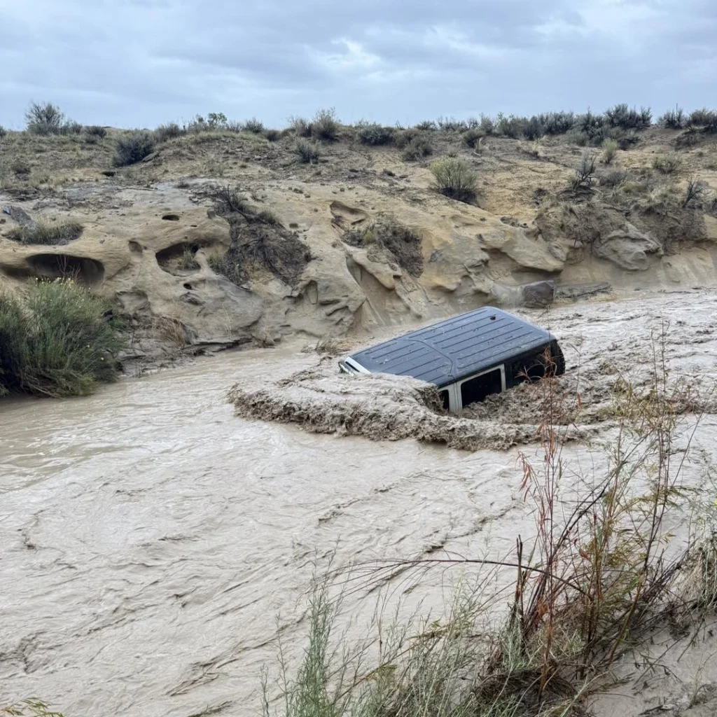 A jeep getting swep away by flood waters in New Mexico on October 11, 2025. Credit: San Juan County Fire & Rescue