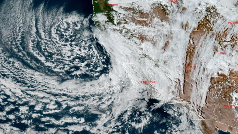 Satellite image of the rare October storm moving into California as of 23:00 UTC on October 13, 2025. Credit: NOAA/GOES-19, RAMMB/CIRA, The Watchers