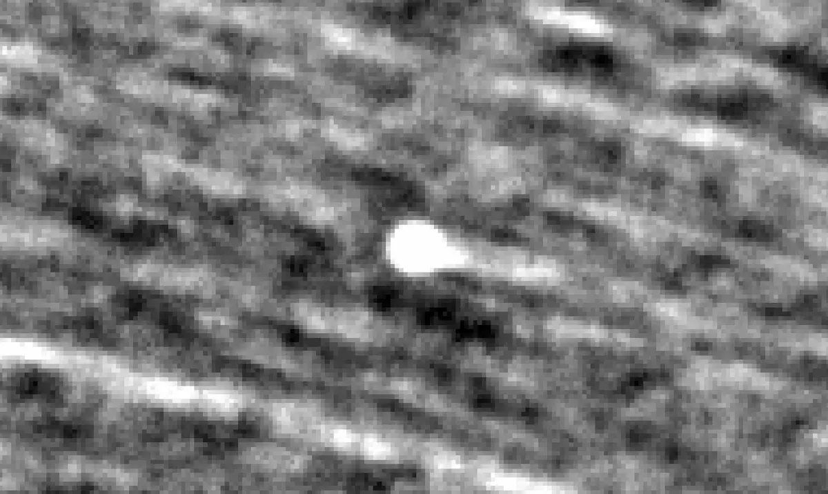 Comet 3I-ATLAS appears as a bright object near the center of this image, made from combining observations from NASA’s PUNCH mission taken from Sept. 20 to Oct. 3, 2025