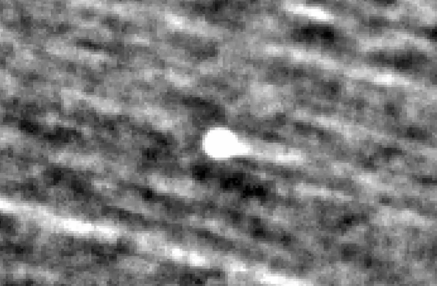 Comet 3I-ATLAS appears as a bright object near the center of this image, made from combining observations from NASA’s PUNCH mission taken from Sept. 20 to Oct. 3, 2025