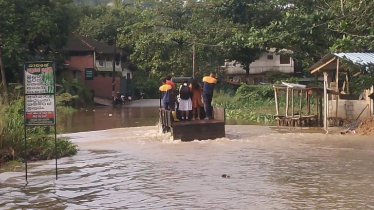 Students using trucks for transportation amid deadly flooding in Sri Lanka on November 27, 2025. Credit: DMC