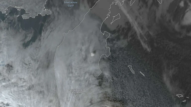 ash rising above bezymianny volcano on november 26 2025