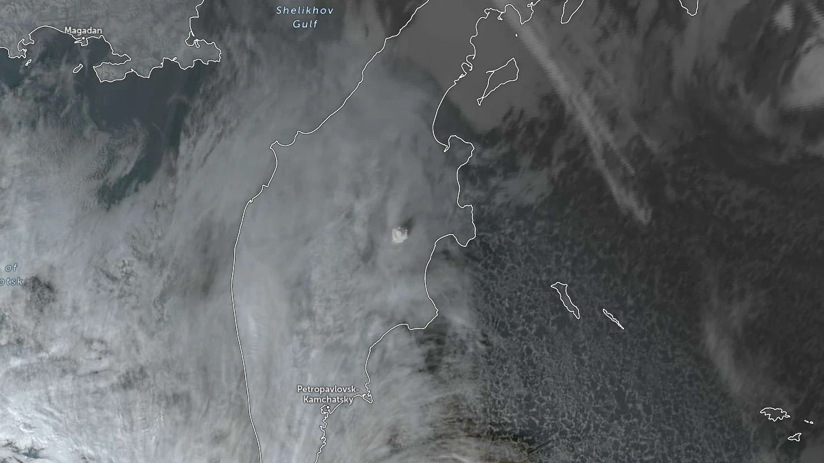 ash rising above bezymianny volcano on november 26 2025