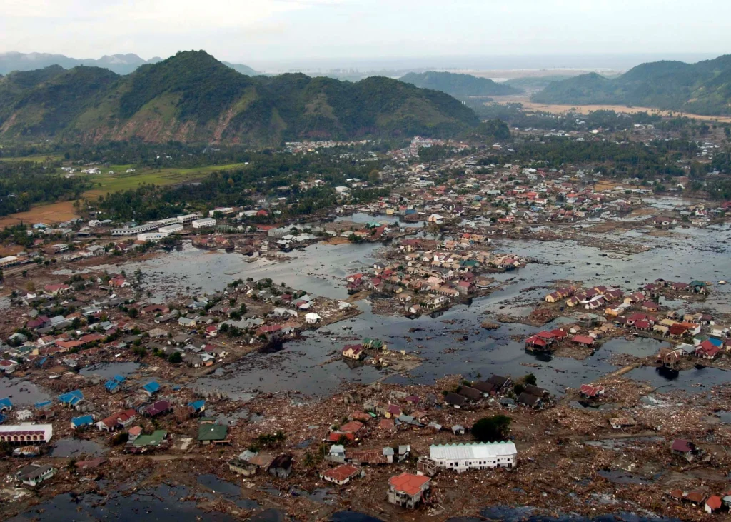 A village near the coast of Sumatra lies in ruins after the Tsunami that struck South East Asia
