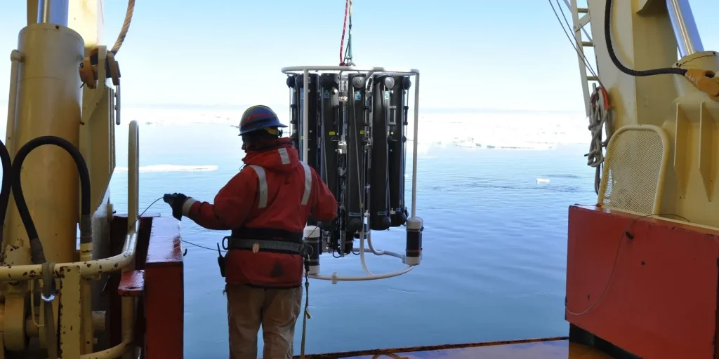 Deployment of an instrument used to collect water samples from different ocean depths in the northern Ross Sea to determine their iron concentration