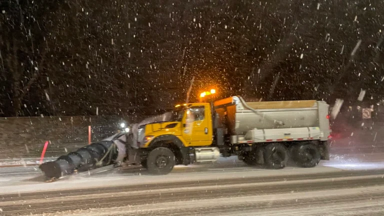 Snwo plow clearing roads in New York as a major winter drops heavy snow across the Northeast U.S. on December 26, 2025