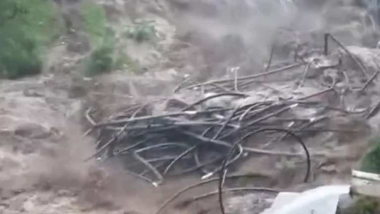 Pedestrian bridge gets swept away by flash flood in Guci Hot Spring tourist area on December 21, 2025. Credit: Volcaholic