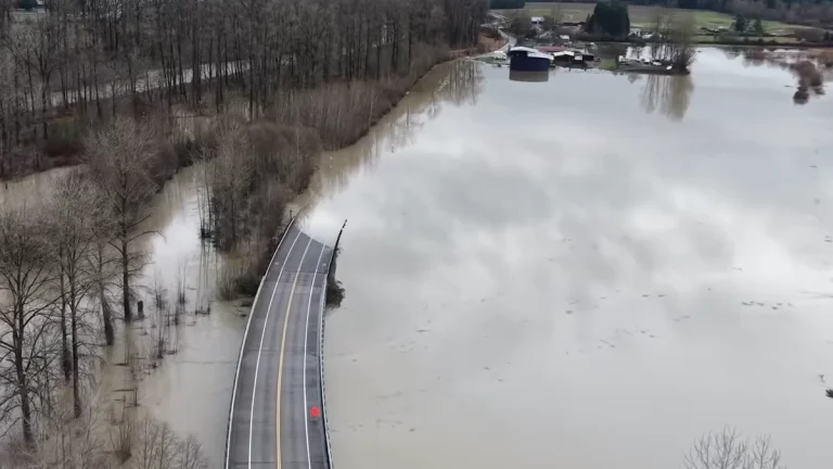 Roads submerged by flooding along the Snoqualmie river, Washington on December 9, 2025