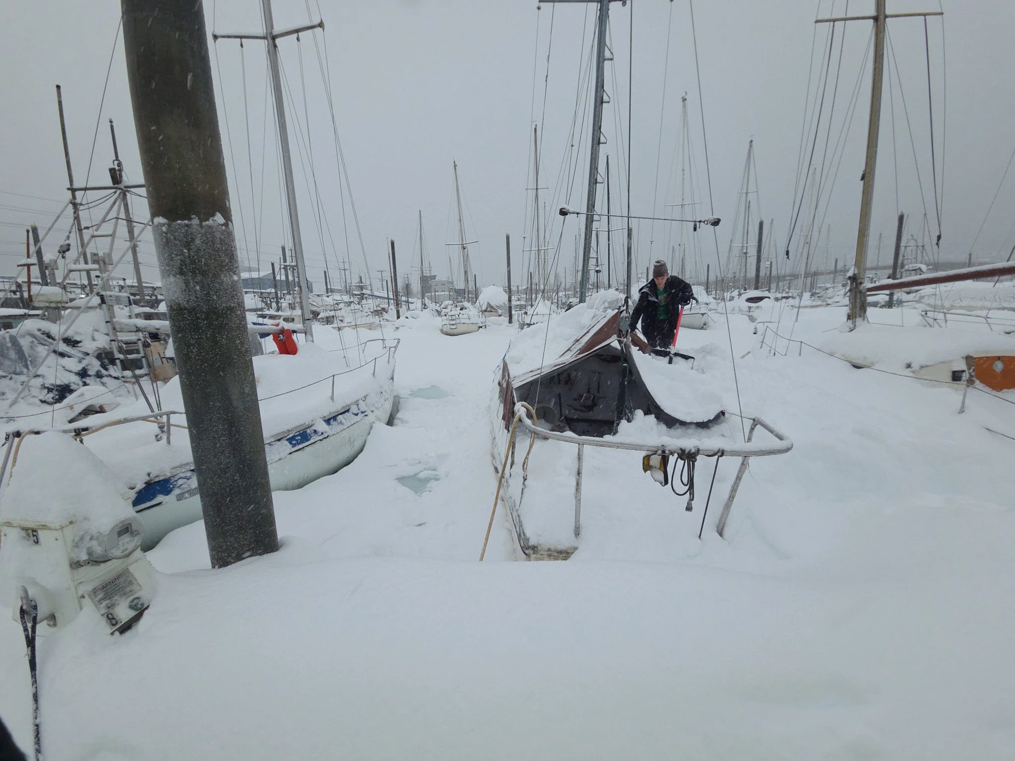 Crews working on sunken vessels were seen in Juneau harbor on January 1, 2025