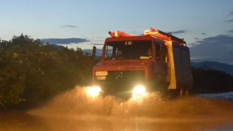 A firetruck driving through floodwaters in Attica, Greece, on January 21, 2026. Credit: Hellenic Fire Corps
