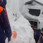 Heavy snow buries homes in Kamchatka Peninsula Russia on January 15, 2026