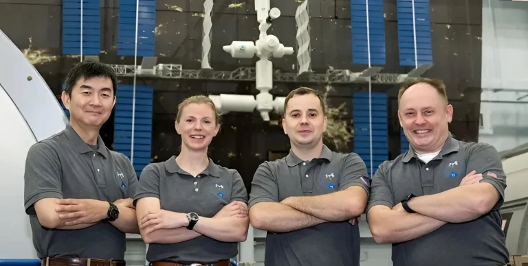 NASA’s SpaceX Crew-11 members stand inside the Space Vehicle Mockup Facility at the agency’s Johnson Space Center in Houston. From left are Mission Specialist Kimiya Yui from JAXA (Japan Aerospace Exploration Agency), Commander NASA astronaut Zena Cardman, Mission Specialist Oleg Platonov of Roscosmos, and Pilot NASA astronaut Mike Fincke. Credit: NASA
