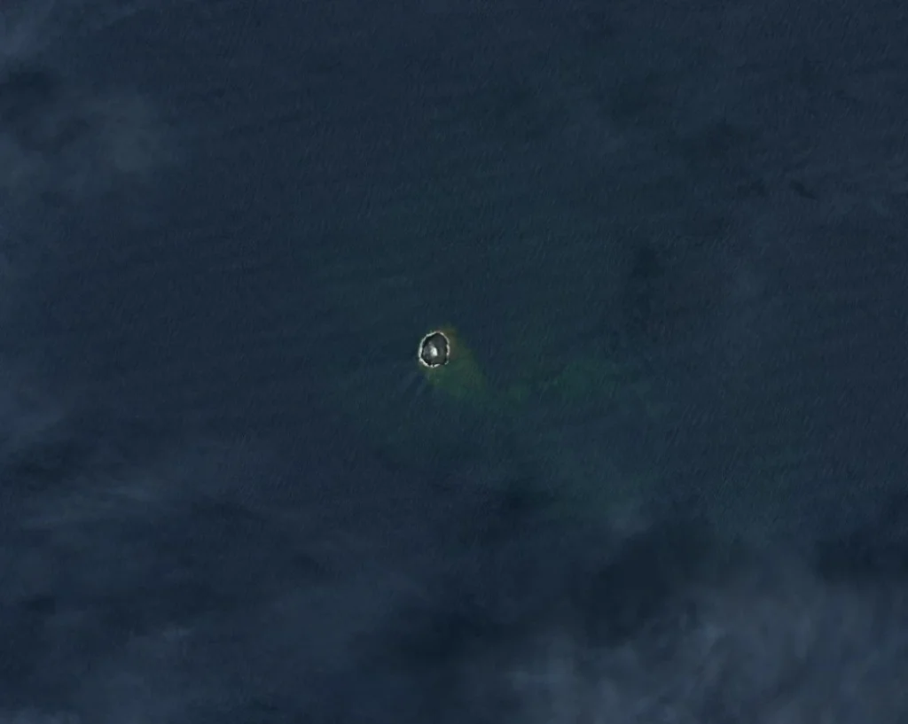 home reef volcano satellite december 3 2025 landsat