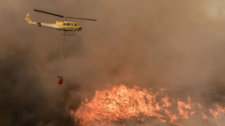 A Kishugu Aviation helicopter assisting in widlfire supression efforts in South Africa on March 16, 2026