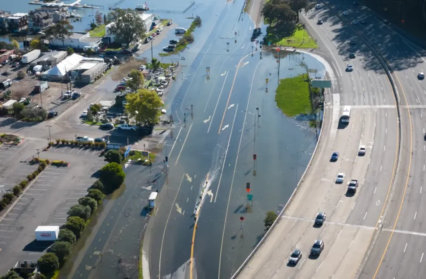 An unusually high tide, called a King Tide, floods a highway on-ramp in Northern California in January 2023. Sea level rise and El Niños can exacerbate this type of flooding