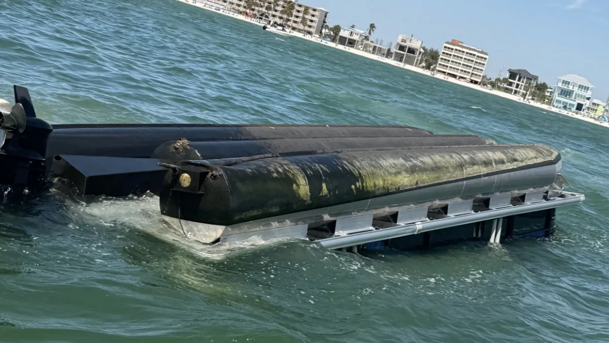 Capsized pontoon boat near Fort Myers Beach Florida that left 2 injured on March 24, 2026
