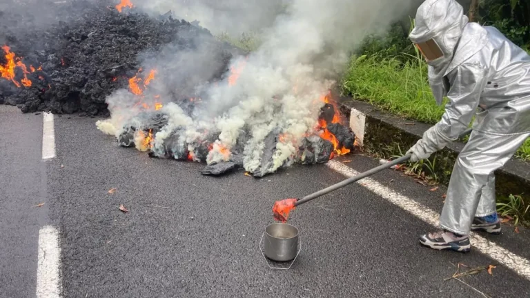Lava from Piton de la Fournaise crosses RN2 coastal road, Réunion Island march 13 2026