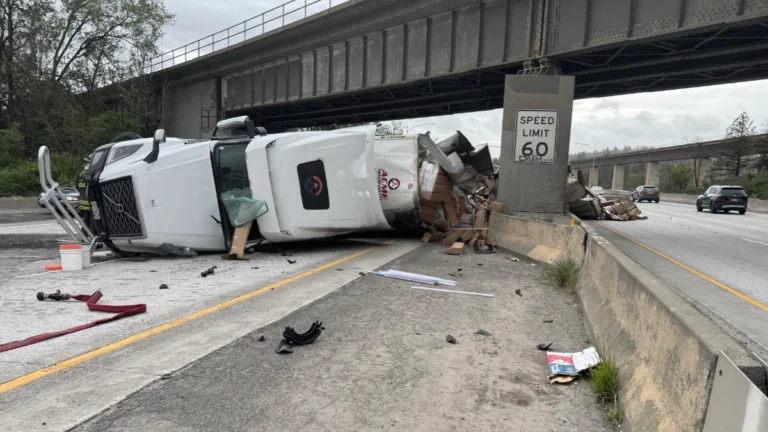 Semi truck flipped on its side on I-90 near Spokane Washington on May 13, 2026, amid dust storms in the area.