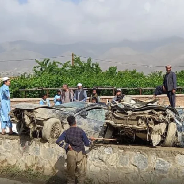 Vehicles damaged by flooding in Afghanistan May 22, 2026