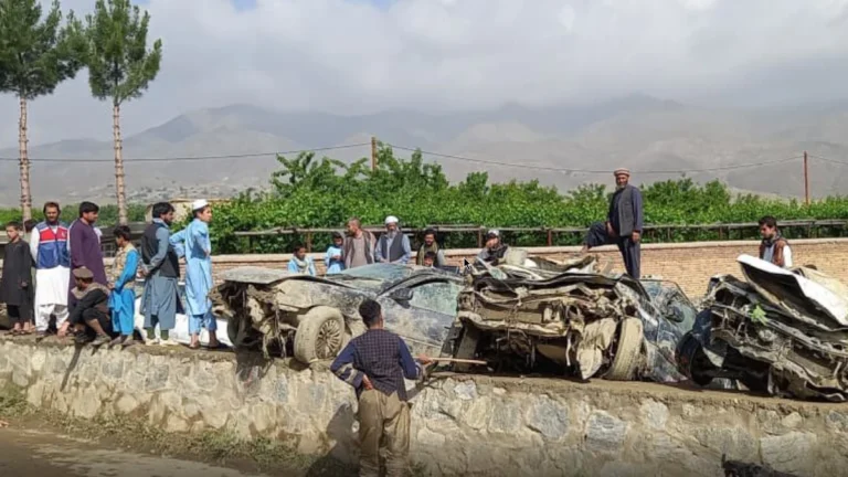 Vehicles damaged by flooding in Afghanistan May 22, 2026