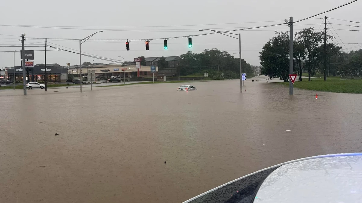 A car submerged in floodwaters in Richmond, Kentucky on June 27, 2026