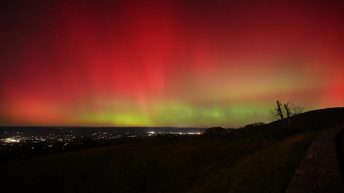 A rare low-latitude red aurora over Luray. Medieval records describe similar red lights appearing over Kyoto during a period of exceptionally high solar activity in the early 13th century.