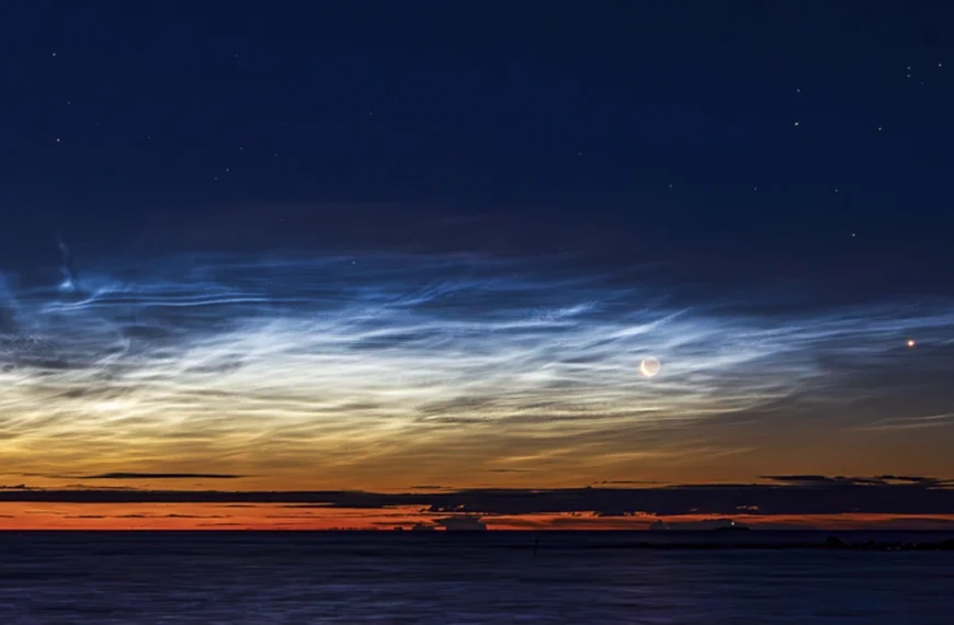 Late season noctilucent clouds and the crescent moon seen from Björköby (Korsholm municipality), Finland on August 21st 2025. Credit: Sebastian Sainio