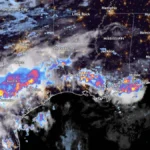 Satellite image of the US gulf coast at 1040 UTC on June 15, 2026, with rain radar.