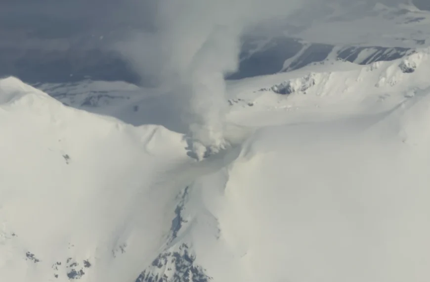 Vigorous steaming is visible from the persistently active fumarole field to the west of the summit of Mount Kupreanof in this oblique aerial photo taken on June 5, 2026. Although steaming in this location is typical, the degassing plume now contains more sulfur dioxide, indicating that magma has intruded to relatively shallow levels beneath the volcano. Credit: Carson Klemp.