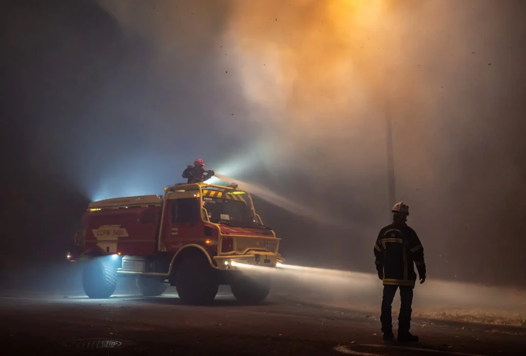 Firefighters battle a rapidly spreading wildfire near Lège-Cap-Ferret, Gironde, France, on July 24, 2026