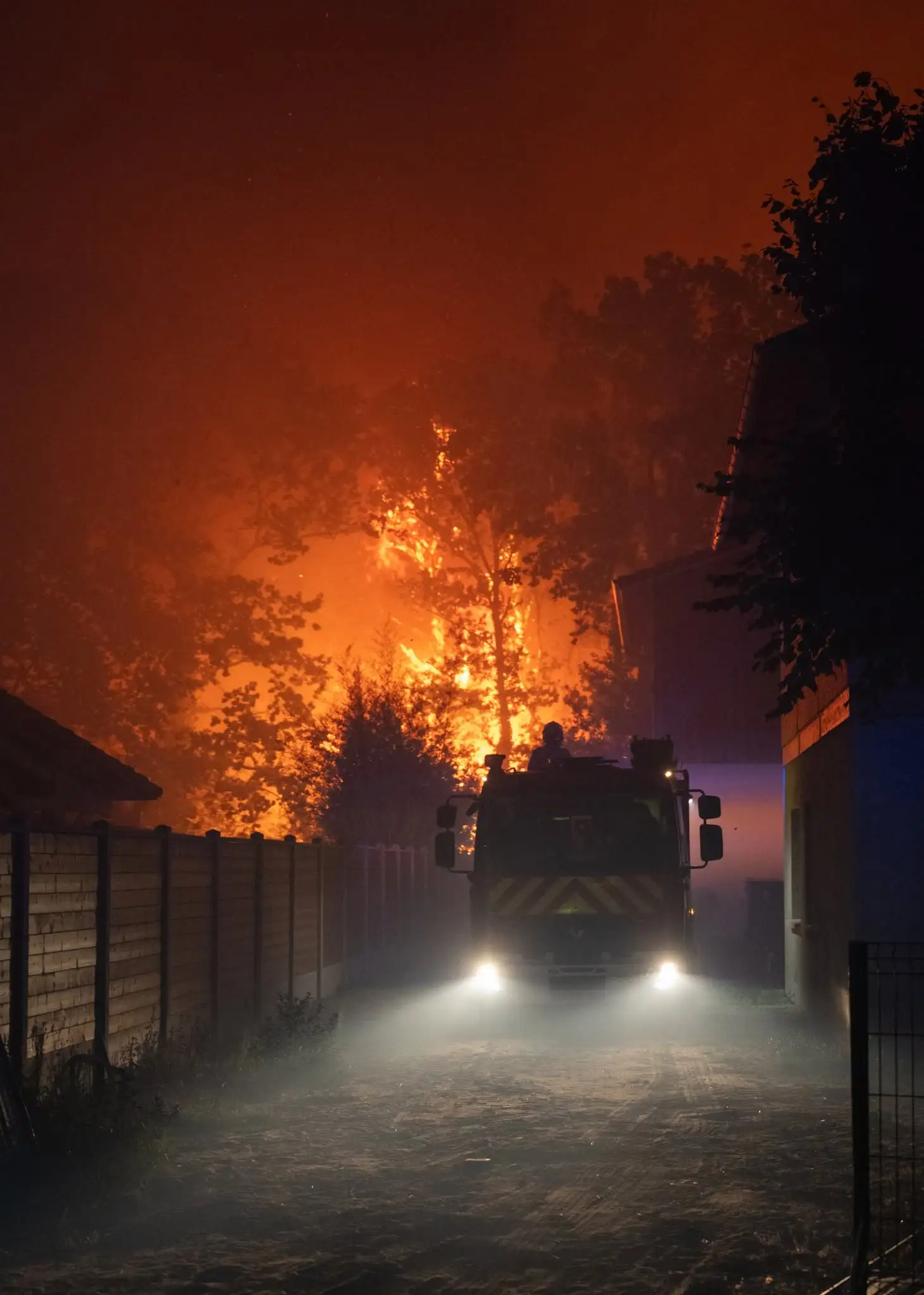 Firefighters battle a rapidly spreading wildfire near Lège-Cap-Ferret, Gironde, France, on July 24, 2026