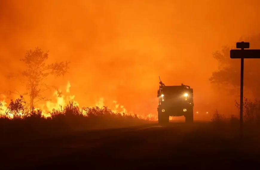 Firefighters battle a rapidly spreading wildfire near Lège-Cap-Ferret, Gironde, France, on July 24, 2026