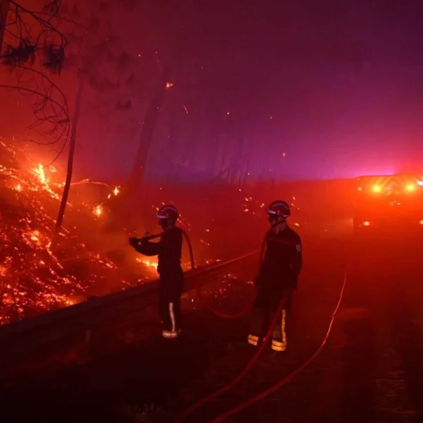 Firefighters battle the Fontainebleau wildfire near Paris, France, July 13, 2026