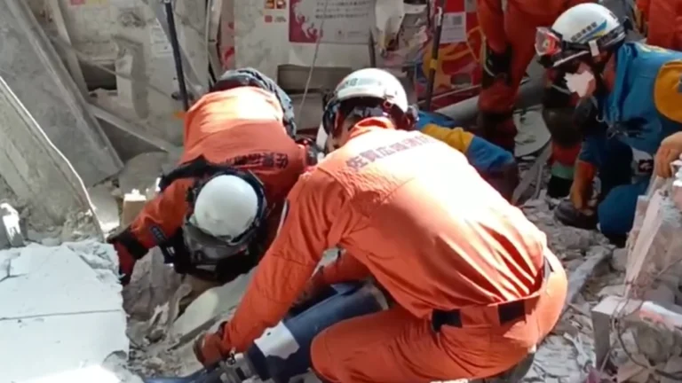 Rescues operatives searching through rubble for survivors of M7.1 Kumamoto Earthquake that struck Japan on July 28, 2026
