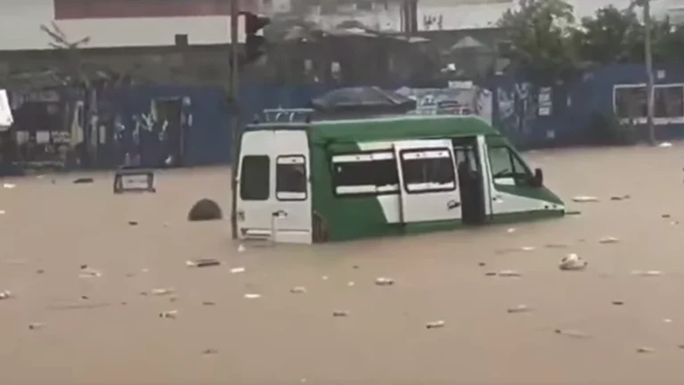 Van submerged in floodwaters Abidjan, Ivory Coast.