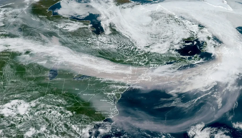 wildfire smoke canada usa satellite image 1930 utc july 15 2026