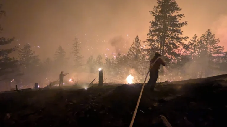 Firefighters supressing the Bald Range Fire in British Columbia Canada on August 8, 2026