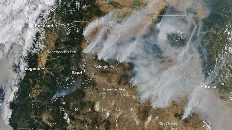 Smoke pours from dozens of large fires in Oregon in this image captured by MODIS (Moderate Resolution Imaging Spectroradiometer) on NASA's Aqua satellite on July 26, 2026.