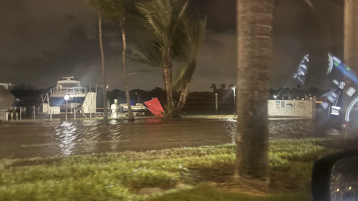 coastal flooding occuring on Collins Avenue in Miami Beach on October 27, 2026