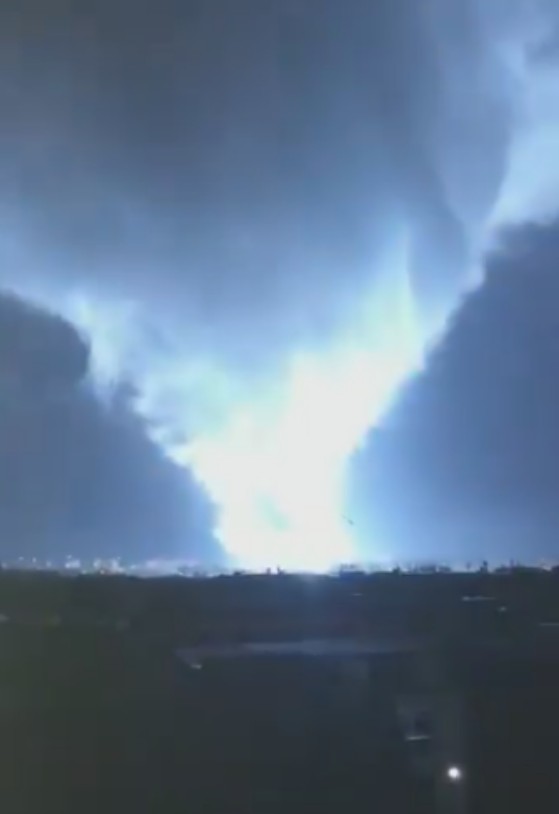 Tornado in Campania, Italy on March 12, 2018 illuminated by a power flash
