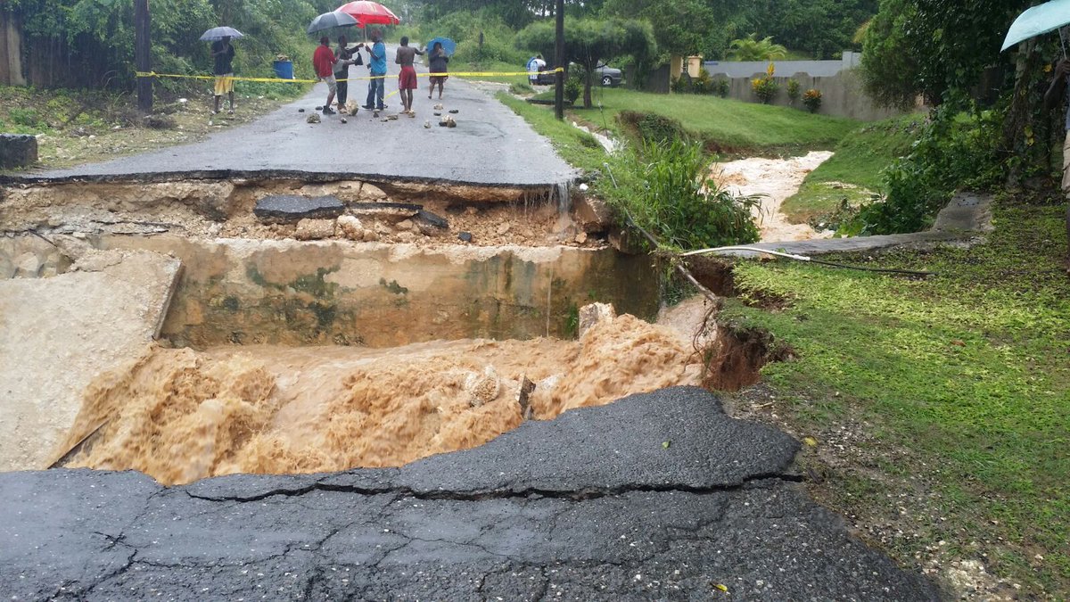 Flood damaged road in St Ann, Jamaica on December 11, 2016