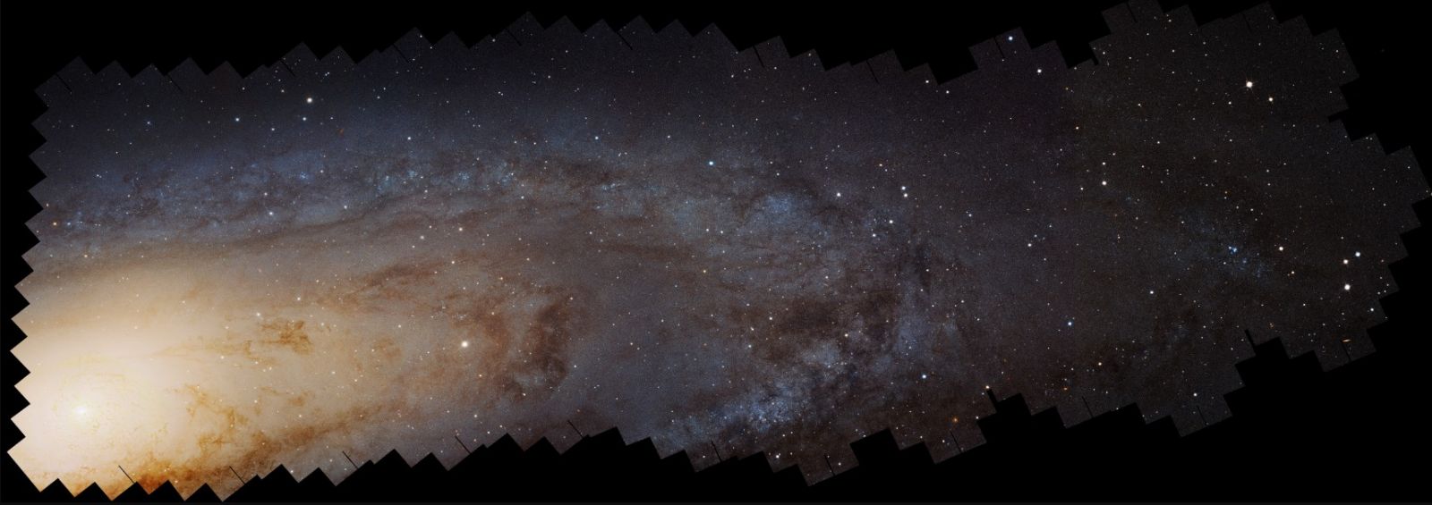 Giant Black Hole Pair Photobombs Andromeda Galaxy