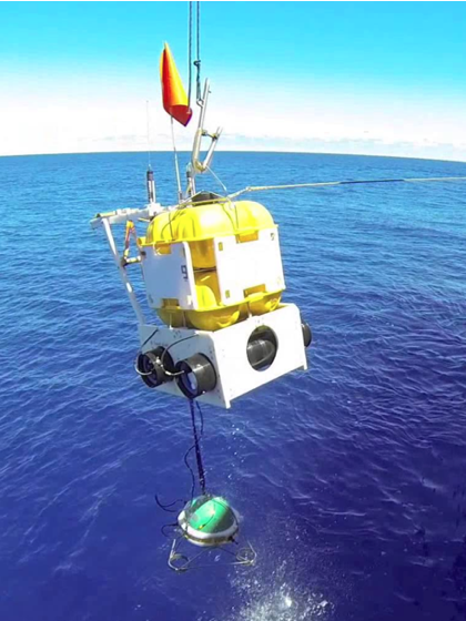 An Ocean-Bottom Seismometer used in the study being put into the water