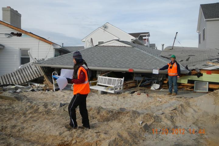 Researchers examining the damage after the passage of Hurricane Sandy. Image credit: Ning Lin, Princeton University